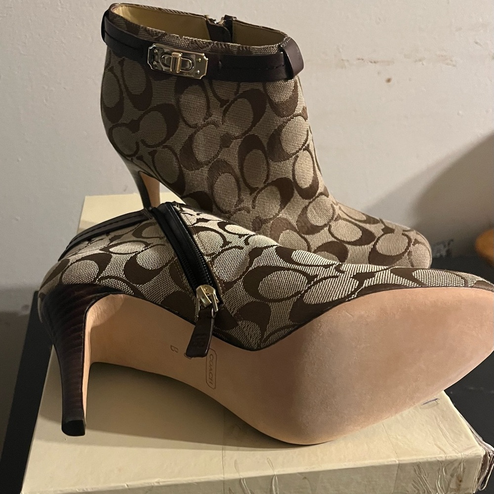 Brand new Coach heeled bootie size 9